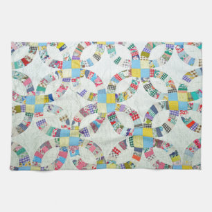 Colourful patchwork quilt tea towel