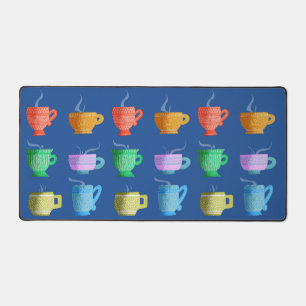 Colourful Patterned Whimsical Mugs on Blue Desk Mat