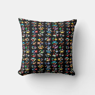 Colourful paw prints cushion