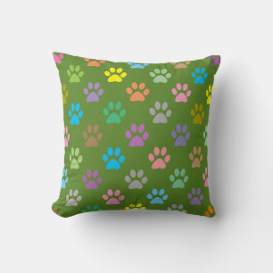 Colourful paw prints pattern cushion