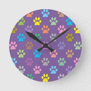 Colourful paw prints pattern round clock