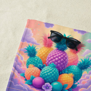 Colourful pineapples beach towel