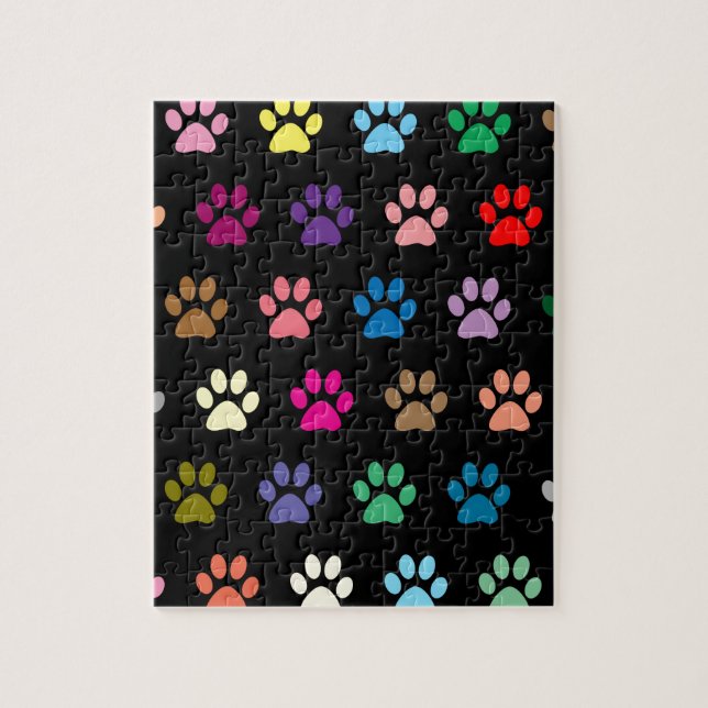 Colourful puppy paw prints on black jigsaw puzzle (Vertical)