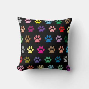 Colourful puppy paw prints throw pillow