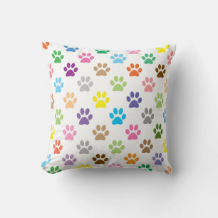 Colourful puppy paw prints throw pillow