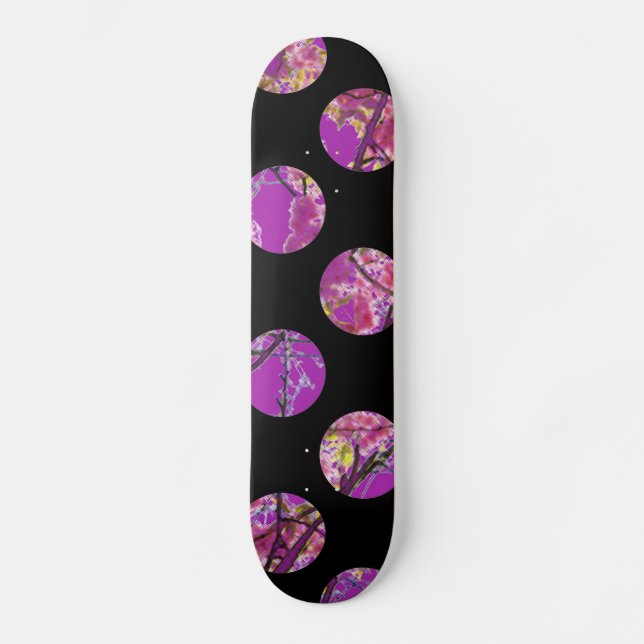 Colourful purple circles on black skateboard (Front)