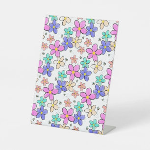 colourful rainbow bright flowers bumble bees flora pedestal sign