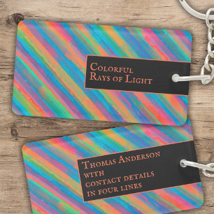 Colourful Rays of Light falling into darkness Key Ring