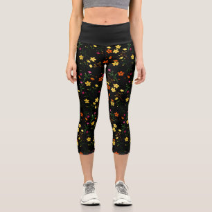 Colourful scattered floral pattern on black base capri leggings