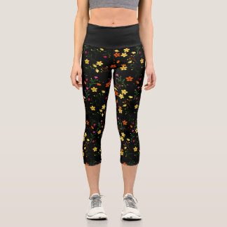 Colourful scattered floral pattern on black base capri leggings