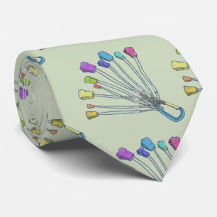 Colourful set of rock climbing nuts tie