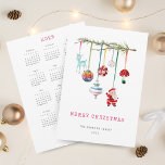 Colourful Simple Merry Christmas Holiday Card<br><div class="desc">The front of the card features a simple and elegant holiday theme. A thin branch adorned with various hanging ornaments, including a reindeer, a rainbow-coloured ball, patterned baubles, a mushroom, and a Santa figurine, adds a whimsical and festive touch. The back of the card showcases a 2025 yearly calendar, providing...</div>