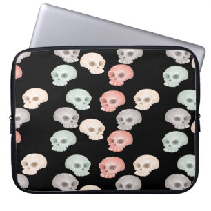 colourful skulls on black laptop sleeve