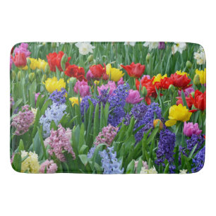 Colourful spring garden flowers bath mat
