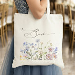 Colourful Spring Wildflower Meadow Garden Wedding  Tote Bag<br><div class="desc">Capture the beauty of nature on your special day with our exquisite wildflower watercolor bride tote bag. Elegant, unique, and blooming with love. Use the text fields to personalise your design with your own wording and details. If you want to change the font style, colour or text placement, simply click...</div>