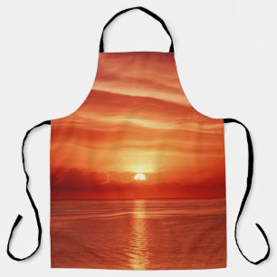Colourful sunrise at sea, dramatic clouds. apron