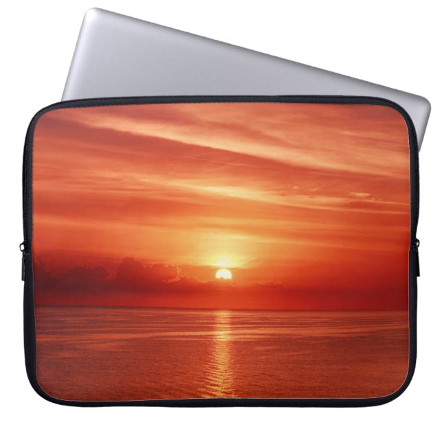 Colourful sunrise at sea, dramatic clouds. laptop sleeve (Front)