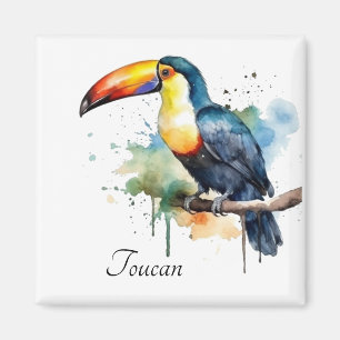 colourful toucan sitting on a  branch magnet