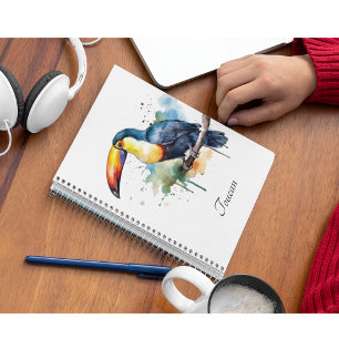 colourful toucan sitting on a branch notebook