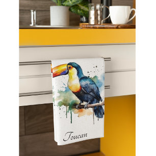 colourful toucan sitting on a  branch tea towel