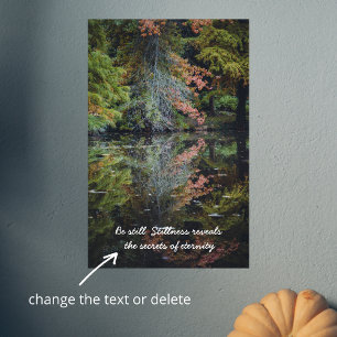 Colourful trees reflecting upon the calm water poster