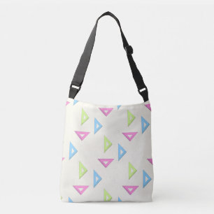 Colourful triangle ruler on cream crossbody bag