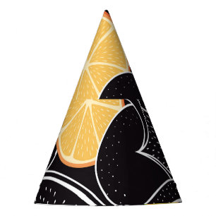 Colourful tropical fruits, black background. party hat