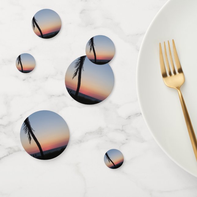 Colourful tropical sunset on table confetti (Group)