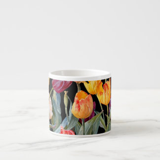 Colourful tulips, isolated black background. espresso cup