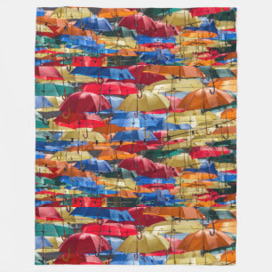Colourful umbrellas in the sky blue orange red  fleece blanket