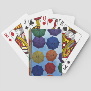 Colourful umbrellas playing cards