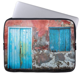 Colourful wall, door and shutters laptop sleeve
