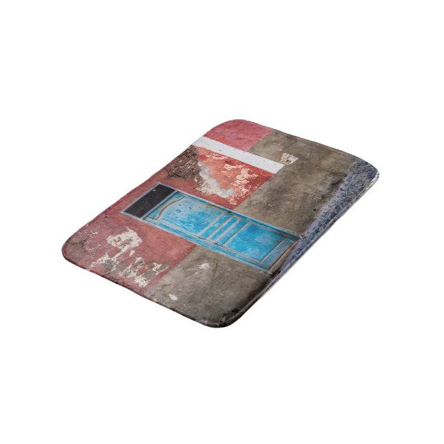 Colourful wall with blue door bath mat (Angled)