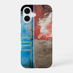 Colourful wall with blue door iPhone 16 case