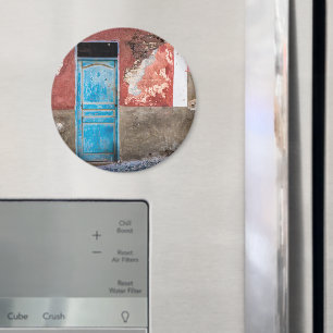 Colourful wall with blue door magnet