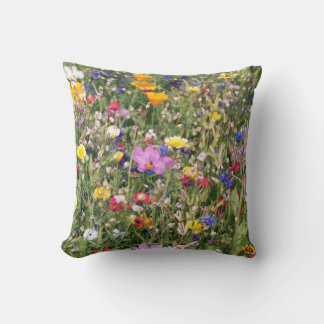 Colourful wildflower meadow, vibrant pattern. cushion