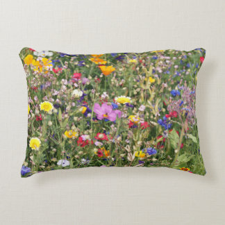 Colourful wildflower meadow, vibrant pattern. decorative cushion