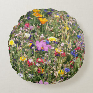 Colourful wildflower meadow, vibrant pattern. round cushion