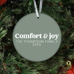 Comfort & Joy Modern Minimal Sage Green Christmas Ornament<br><div class="desc">Unveil our "Comfort & Joy" Modern Simple Sage Green Christmas Ornament, a delightful and contemporary addition to your holiday decor. Made from shatterproof materials, this ornament seamlessly blends the latest trends with the enduring charm of the festive season. Customise this unique ornament with your most cherished family photos or beloved...</div>
