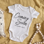 Coming Soon New Baby  Announcement Unisex Baby Bodysuit<br><div class="desc">Share your happy news with grandparents, aunts and uncles or special friends with this adorable gender-neutral baby bodysuit pregnancy announcement. Coming Soon is written in a trendy and modern script. The baby's due date is written below. Minimalist design creates a keepsake design. All of the text is editable, so you...</div>