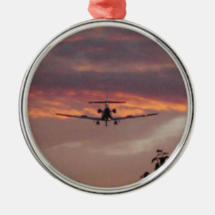 Commercial Jet Landing At Sunset Metal Ornament