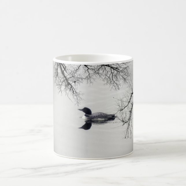 Common Loon Swims in a Northern Lake in Winter Coffee Mug (Center)