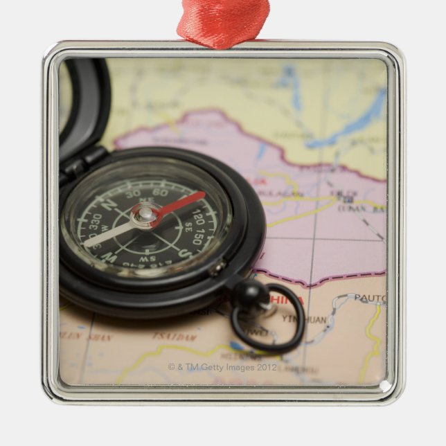 Compass on a map 2 metal tree decoration (Front)