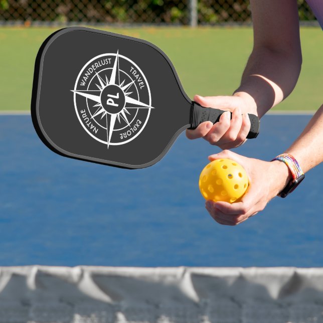 Compass star emblem monogram black and white pickleball paddle (Insitu)