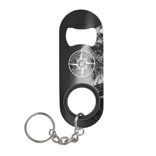 Compass star emblem monogram dramatic mountains