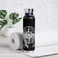 Compass star emblem monogram dramatic mountains