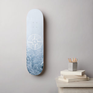 Compass star emblem monogram winter spruce forest skateboard