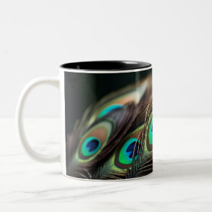 Composition of bright peacock feathers Two-Tone coffee mug