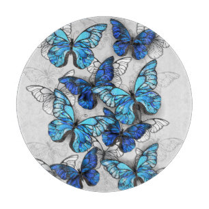 Composition of White and Blue Butterflies Cutting Board