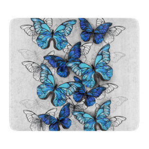 Composition of White and Blue Butterflies Cutting Board